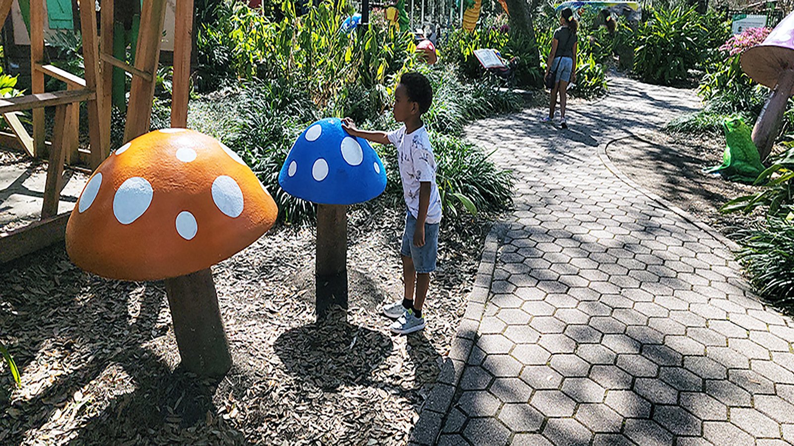 Zee and JJ smelling the mushrooms